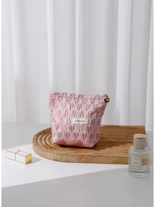 Pink heart texture canvas makeup bag with 3D jacquard pattern and floral zipper slider