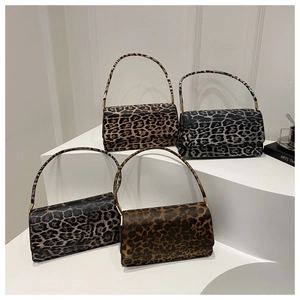 Chic leopard print rectangular shoulder bags in brown and grey displayed on white steps