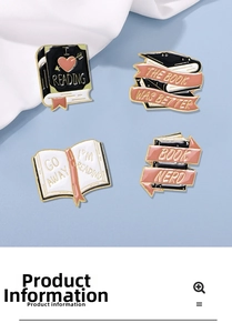 Detail of four bookish enamel pins with literature slogans on white fabric background