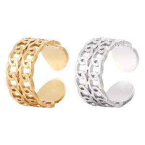 Detail view of gold and silver hollow chain rings with adjustable open band design