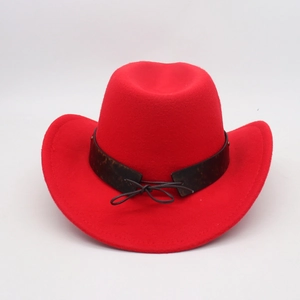 Detail of red wool felt cowboy hat featuring a leopard print band and bull head stud ornament