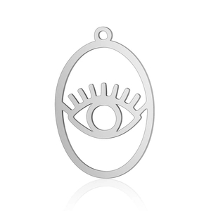 Macro detail of oval stainless steel eye pendant charm with hollow engraved design