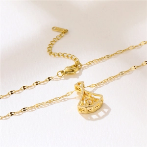 Elegant gold hollow fan-shaped titanium steel necklace with a water wave chain design