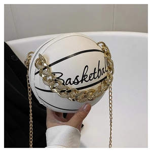 Detailed view of a white basketball-shaped chain bag with gold metal hardware and strap