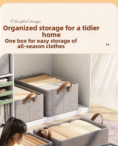 Detail of grey fabric storage box with leather handle for closet clothes organization