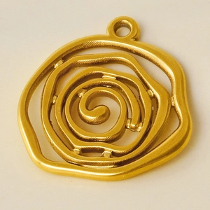 Macro shot of 304 stainless steel golden irregular circle pendant with spiral texture