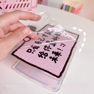Process of peeling protective film from pink acrylic motivational desktop display sign