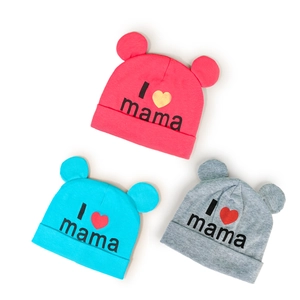 Set of three cute knitted baby hats with 3D ears and I love mama print in soft colors