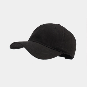 Detailed side view of black cotton baseball cap showing six-panel structure and eyelets