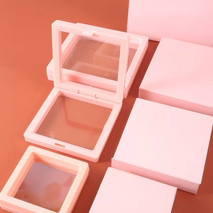 Pink PE film floating display box with matching paper gift packaging set in macro view