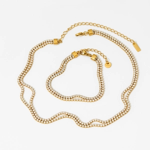 Double row gold stainless steel tennis necklace and bracelet set with clear cubic zirconia