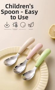 Macro detail of ergonomic 316L stainless steel baby spoons in pastel colors