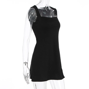Detail view of a black sleeveless mini dress with a retro square neck on a mannequin
