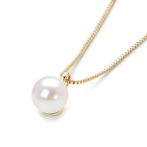 Close-up of a lustrous white round pearl pendant on a delicate golden box chain