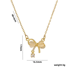 Gold bow necklace with heart cat eye stone and cubic zirconia pendant, 40+5cm O-chain