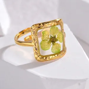 Minimalist square gold ring with green dried flower resin inlay and hammered texture