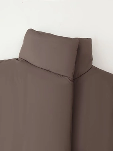 Close-up of the stand-up collar and matte fabric on this warm brown puffer jacket