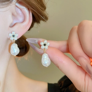 Vintage floral pearl drop earrings with black gemstones and baroque pearls in gold finish
