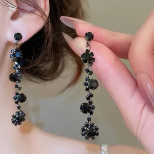 Elegant long black rhinestone tassel earrings with multi-layer cluster dangling design