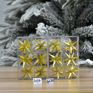 Detail of 6cm gold star Christmas ornaments in packaging for tree decoration