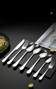 7-piece SUS304 stainless steel cutlery set with mirror finish on black marble surface