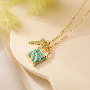 18K gold plated lock and key pendant necklace with green enamel checkers and zircons