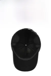 Detail view of thickened thermal lining on a men's winter hat with warm ear protection