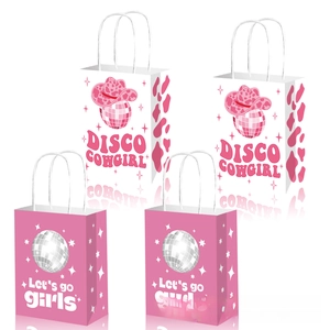 Detailed view of Disco Cowgirl paper gift bags featuring pink cow print and disco ball patterns