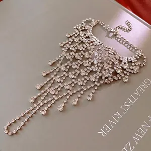Elegant multi-layer silver tassel bracelet with sparkling rhinestones and adjustable chain