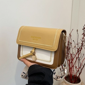 Chic tri-color crossbody bag in yellow, white, and brown PU leather with wide strap