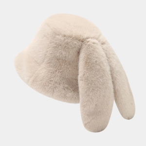 Macro detail of plush faux fur texture on a cream bucket hat with long rabbit ears