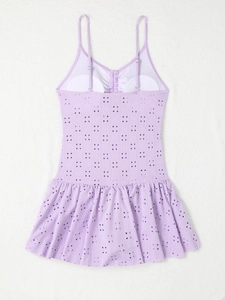 Macro view of lavender eyelet embroidery fabric on a ruffled one-piece swimsuit