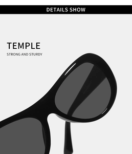 Close-up of thick black acetate sunglasses frame with dark smoke gray lenses details