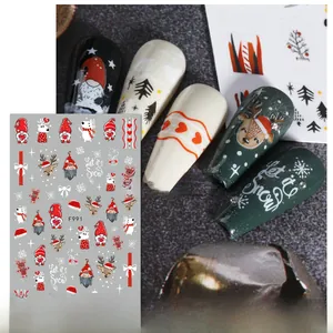 Detail of Christmas nail art stickers model F991 with gnome, reindeer, and snowman patterns
