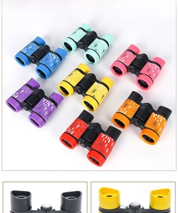 Detail showing seven colorful educational binoculars with non-slip rubber grips
