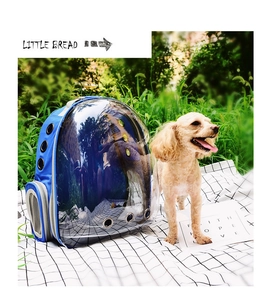 Close-up of blue capsule pet backpack with clear panoramic window and breathable vents