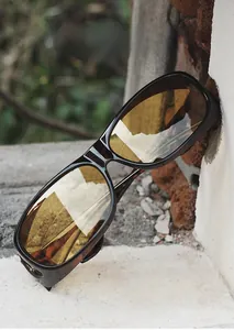 Macro view of tortoiseshell night vision sunglasses with model E5082 and CE certification