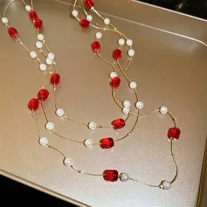 Elegant multi-layer crystal bead and pearl necklace with golden chain in vintage style