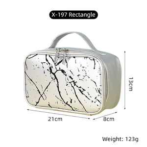 Detail of silver marble makeup bag with reinforced handle and dual zippers 21x8x13cm