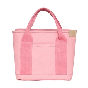 Front view of pink canvas tote bag with reinforced handles and durable fabric detail