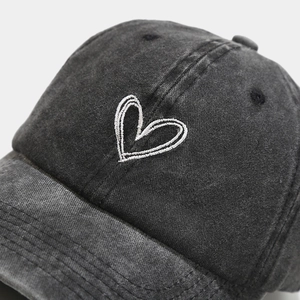 Vintage washed charcoal cotton baseball cap with white heart embroidery for outdoor wear