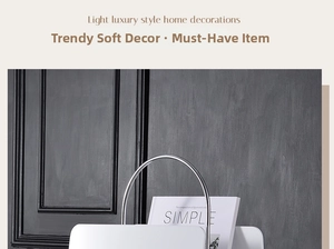 Detail of light luxury cream white magazine rack with chrome handle and sleek finish