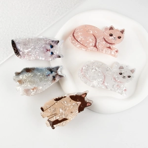 Cute cat shaped cellulose acetate hair claws in various colorful marbled patterns
