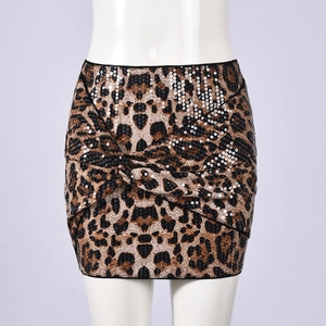 Close-up of leopard print sequin mini skirt featuring a stylish knot front design
