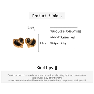 Detailed size and weight specs for gold heart earrings with black enamel and steel posts