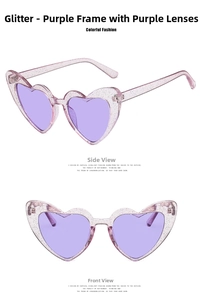 Detail view of heart-shaped sunglasses with purple glitter frames and matching lenses