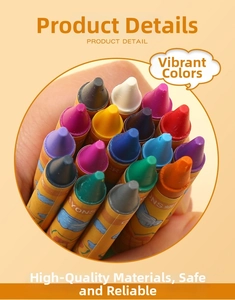 Close-up of hand holding colorful assorted wax crayons with protective paper sleeves