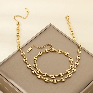 Parure de bijoux avec collier et bracelet en acier inoxydable doré 18 carats