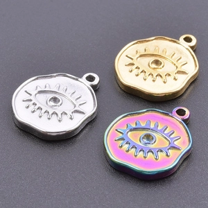 Three devil eye titanium steel pendants in gold, silver, and rainbow colors with small diamonds