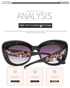 Detailed view of Baroque style sunglasses with floral enamel and golden leaf temple design